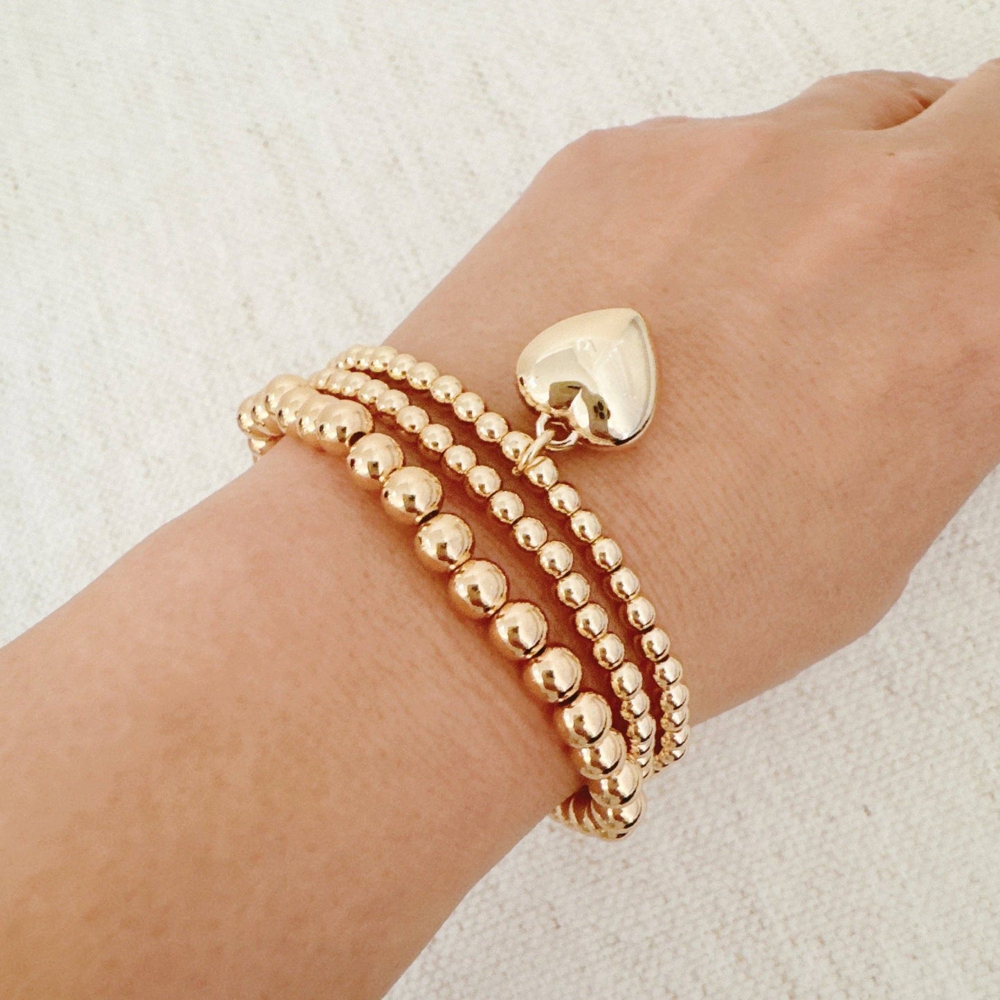 Ball Beads Golden Heart Stretch Bracelet Set Of 3: Gold